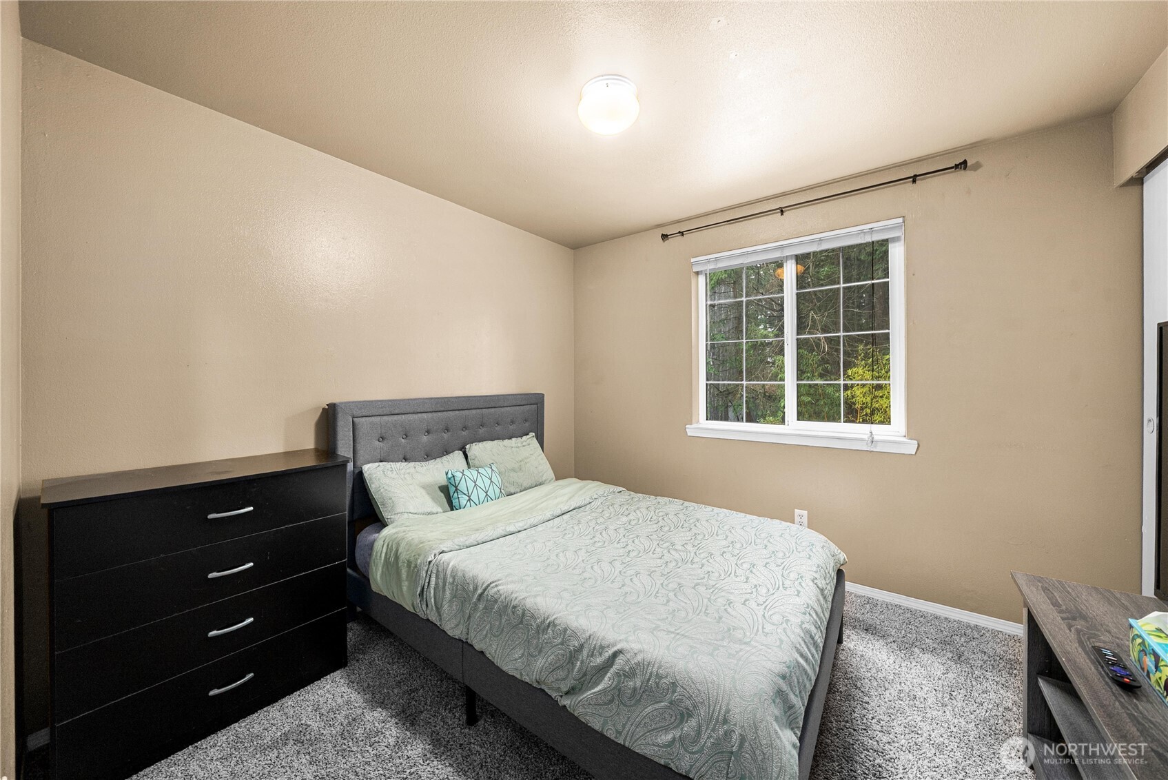 7923 Incline Court Southeast Olympia, WA 98513 - Photo 5 of 19 a bedroom with a bed and window