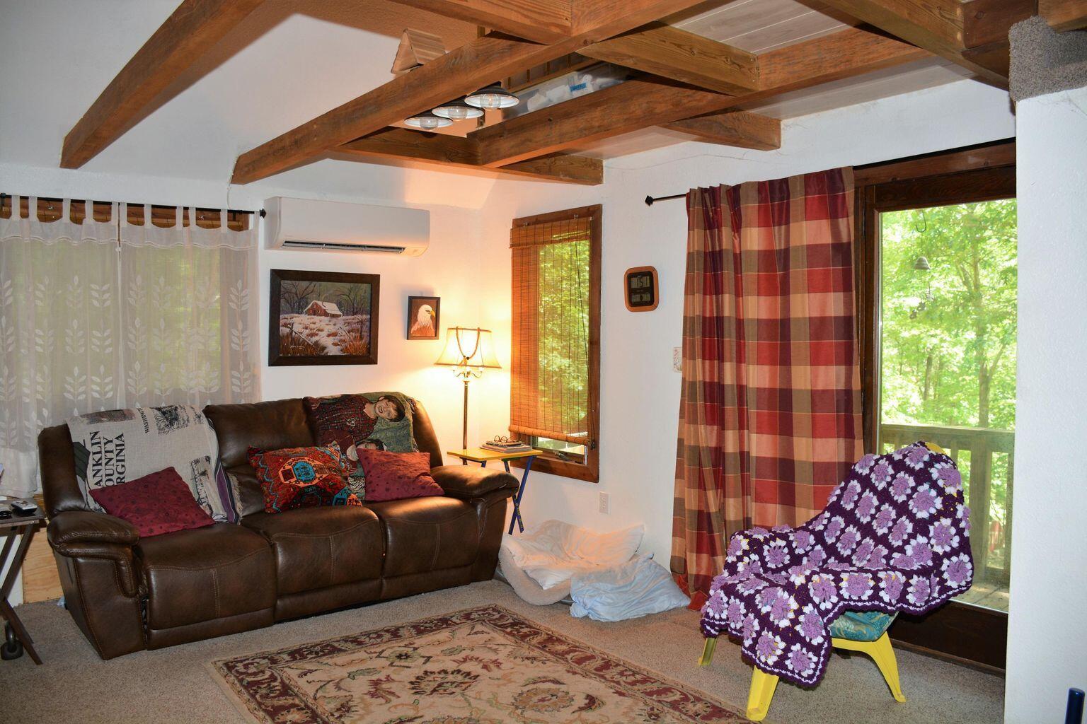 632 Faith Cove Road Sandy Level, VA 24161 - Photo 6 of 20 a living room with furniture and a large window
