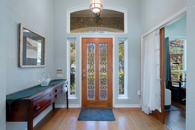 a view of a dining room with furniture window and outside view