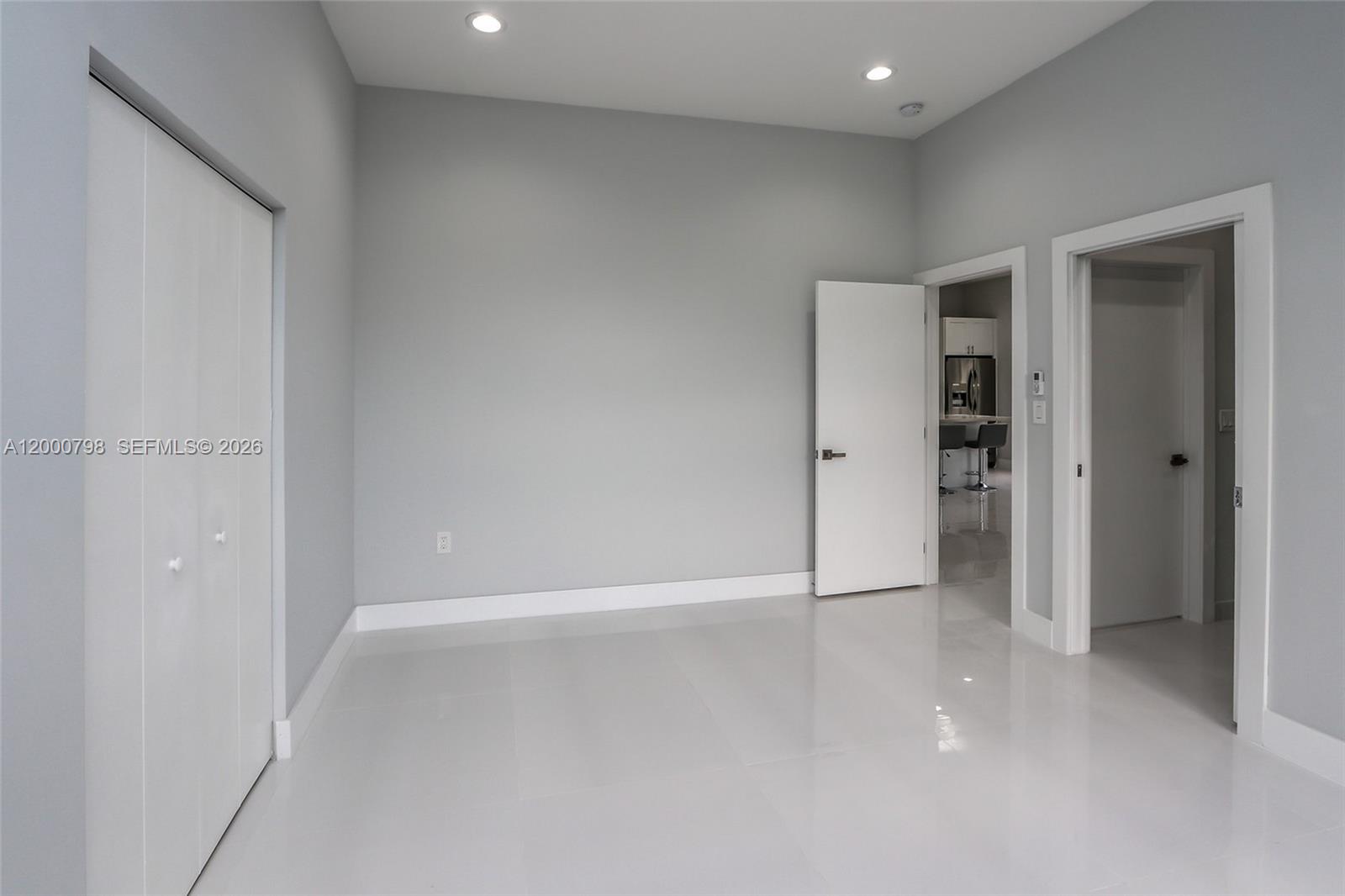 5126 Southwest 57th Avenue Miami, FL 33155 - Photo 16 of 32 wooden floor in an empty room