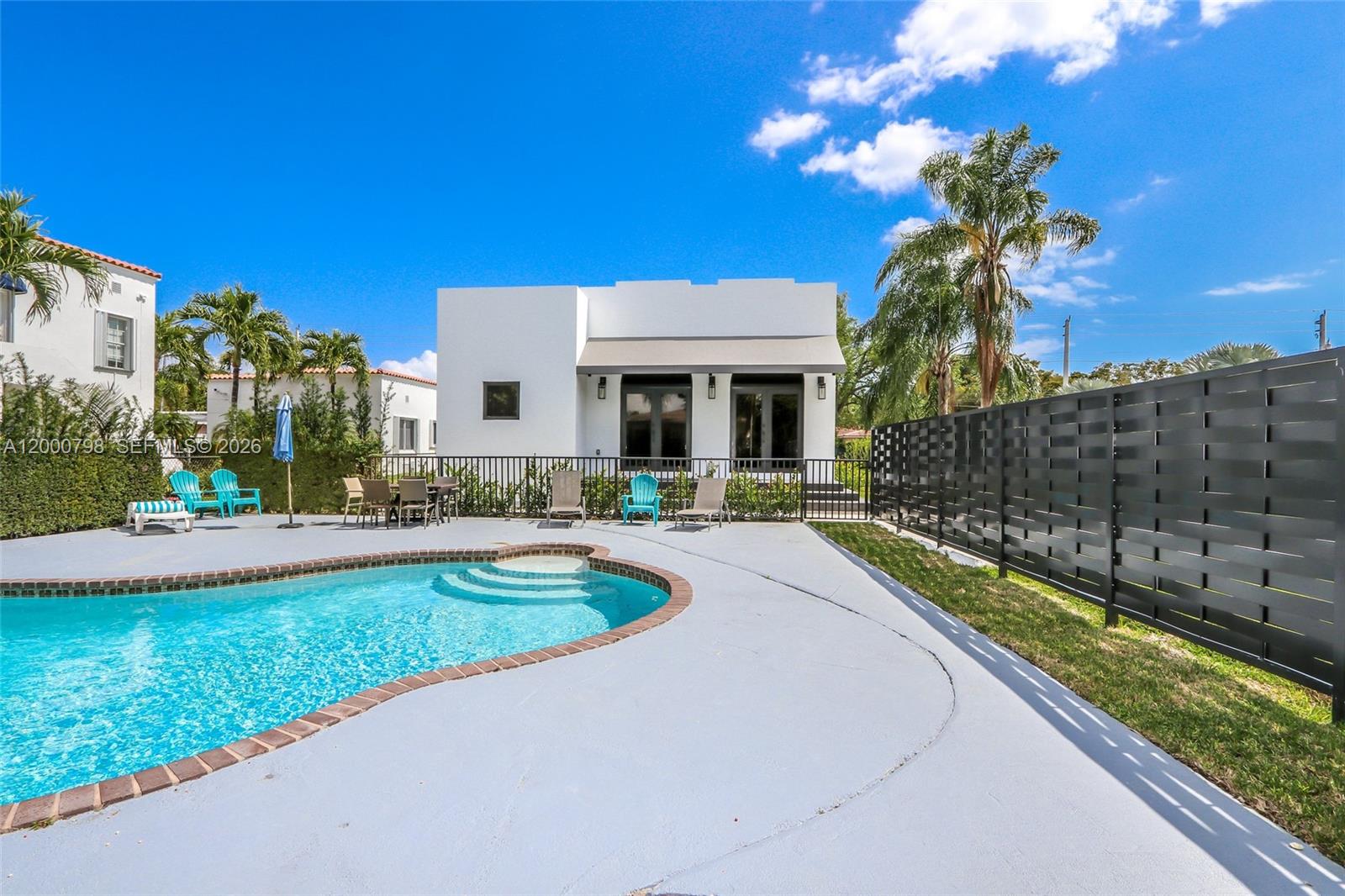 5126 Southwest 57th Avenue Miami, FL 33155 - Photo 27 of 32 a view of house with yard outdoor seating and entertaining space