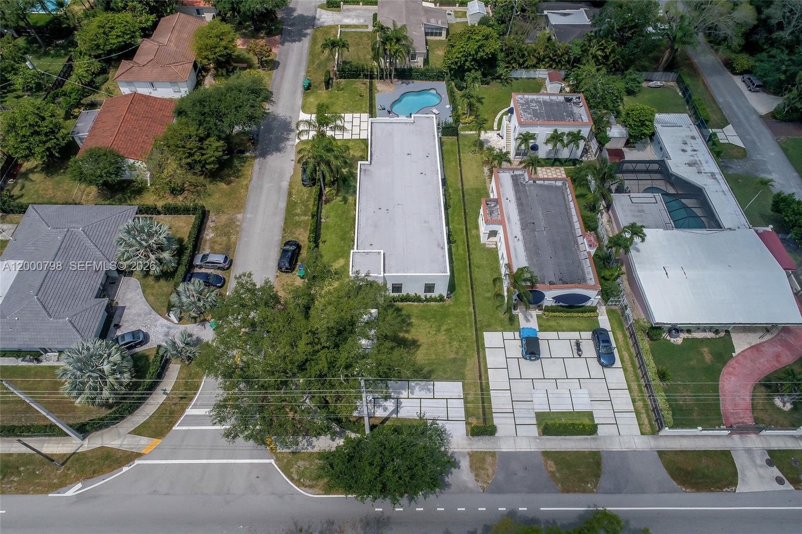 5126 Southwest 57th Avenue Miami, FL 33155 - Photo 29 of 32 an aerial view of a house with garden space and street view