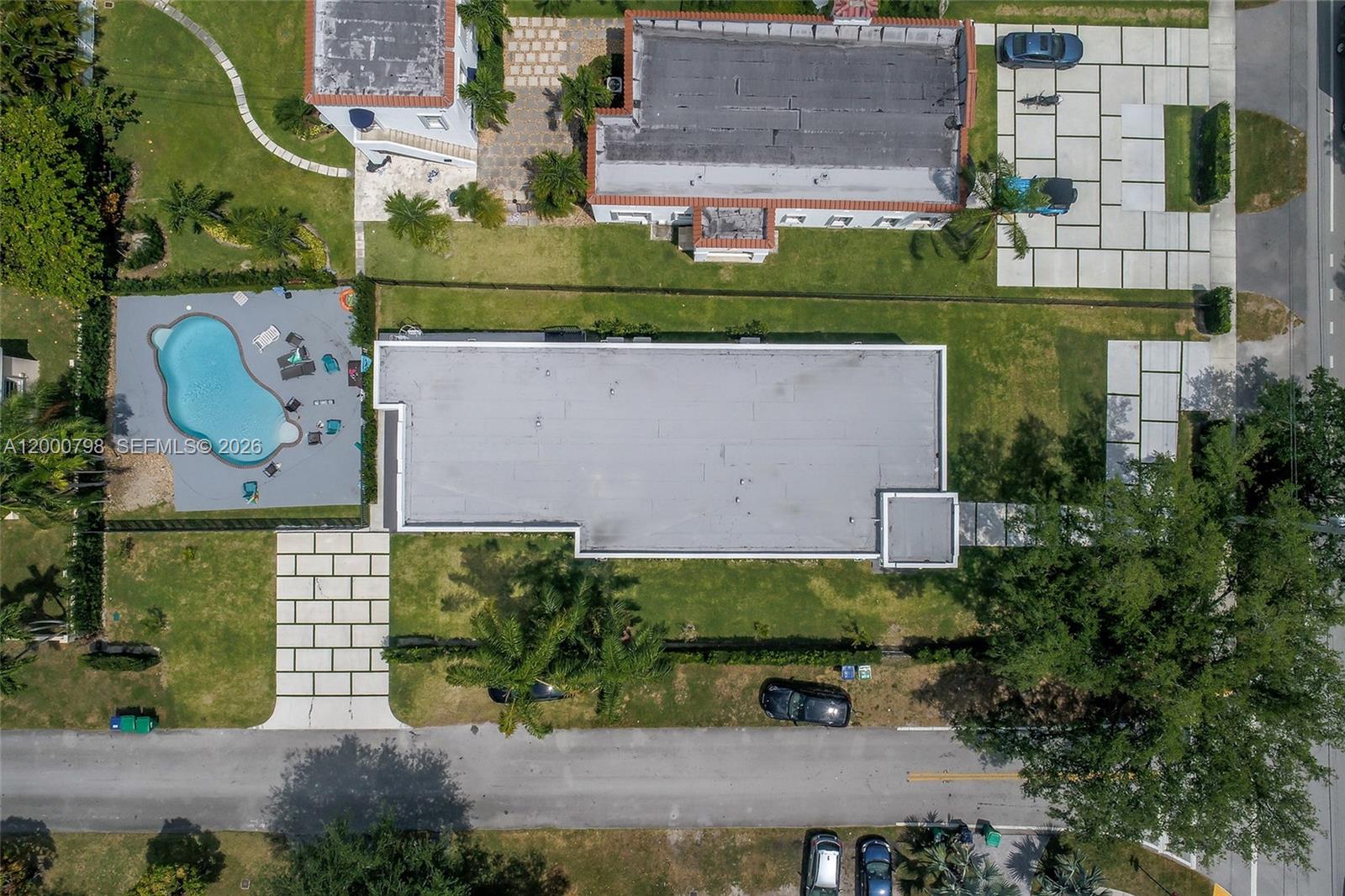 5126 Southwest 57th Avenue Miami, FL 33155 - Photo 30 of 32 an aerial view of a house with a garden