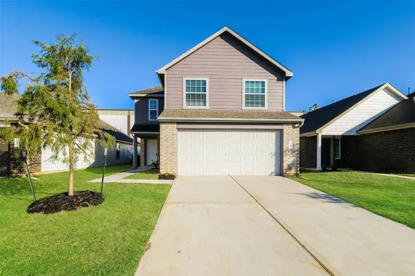 a house view with a garden space