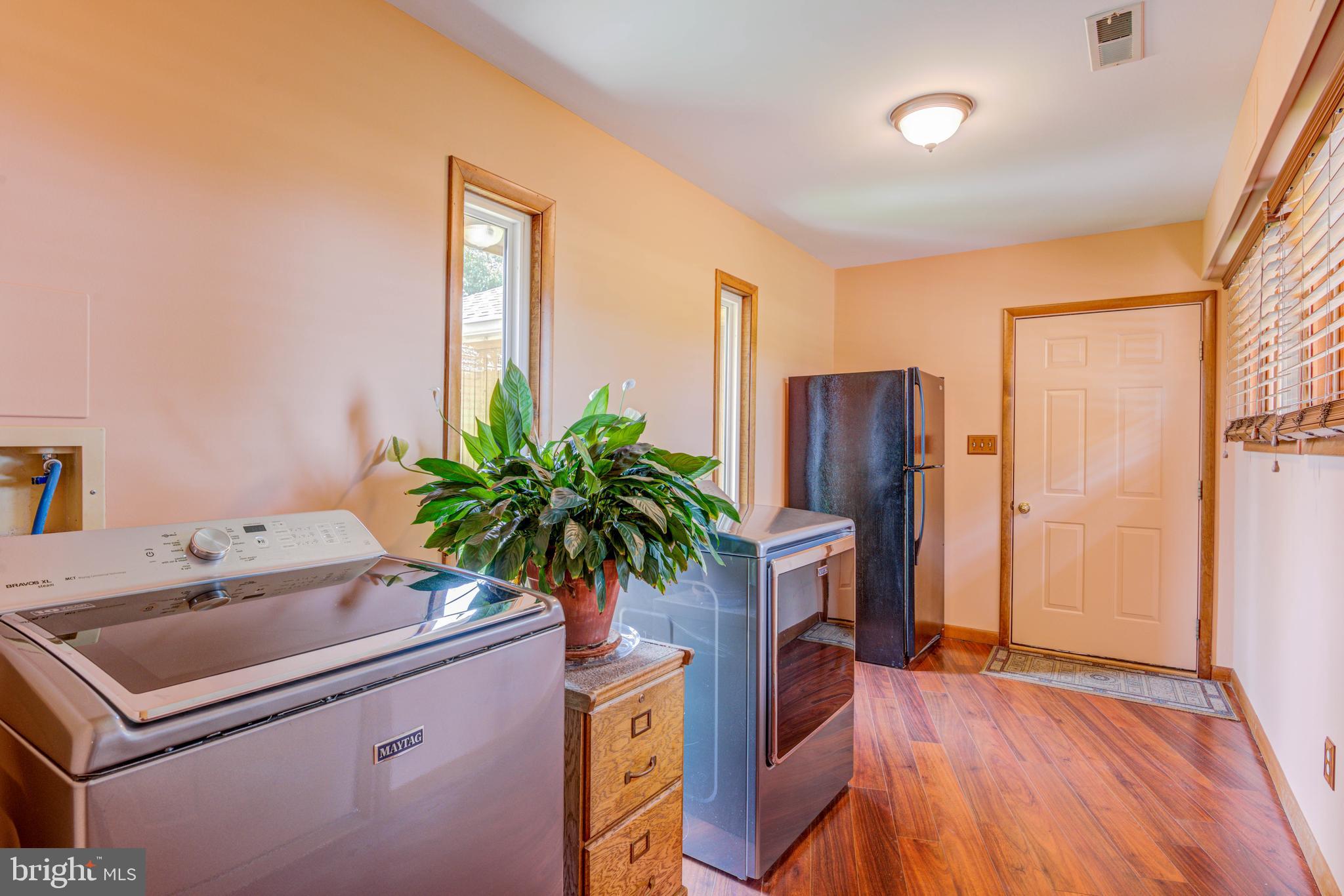 7 Schaffer Lane Lewes, DE 19958 - Photo 40 of 68 LAUNDRY AREA LEADING TO THE OVERSIZED GARAGE