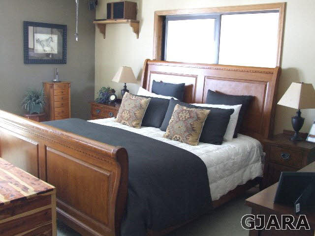 1074 24 Road Grand Junction, CO 81505 - Photo 12 of 37 a bedroom with bed and a window