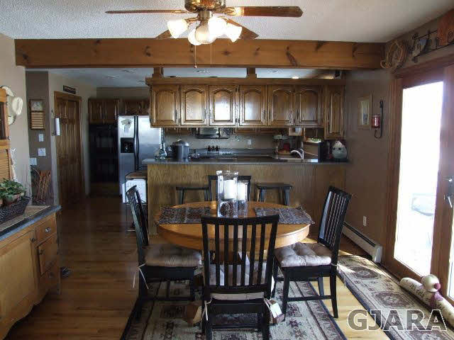 1074 24 Road Grand Junction, CO 81505 - Photo 3 of 37 a dining room with furniture and window
