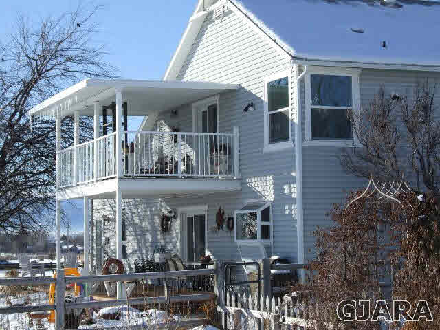 1074 24 Road Grand Junction, CO 81505 - Photo 32 of 37 a front view of a building with balcony