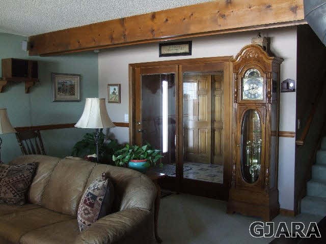1074 24 Road Grand Junction, CO 81505 - Photo 5 of 37 a living room with a couch and a table
