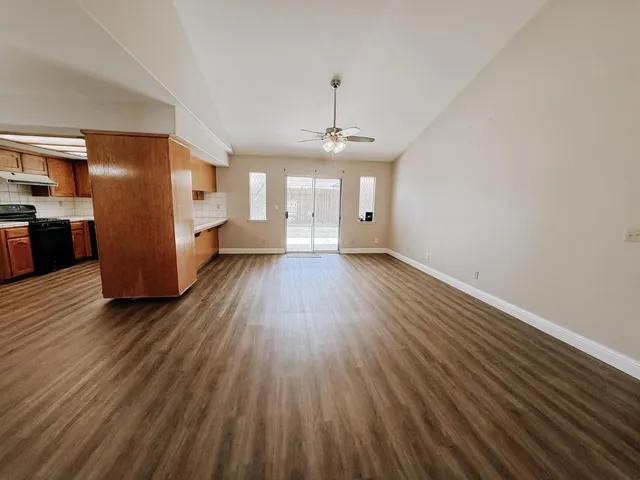 a view of a livingroom with wooden floor
