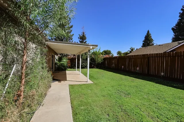 a view of a backyard with a garden