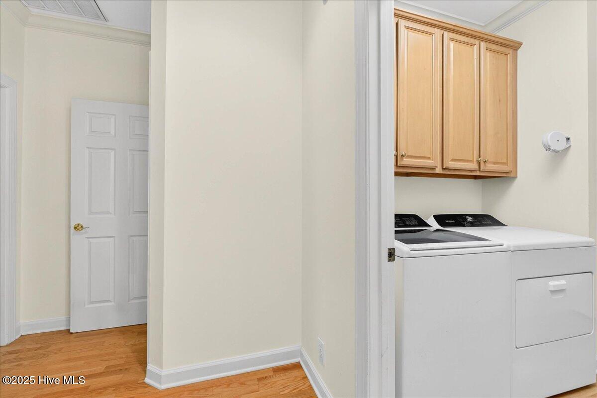 8985 Woodbine Road Southwest Sunset Beach, NC 28468 - Photo 27 of 65 Hallway space with view of laundry room