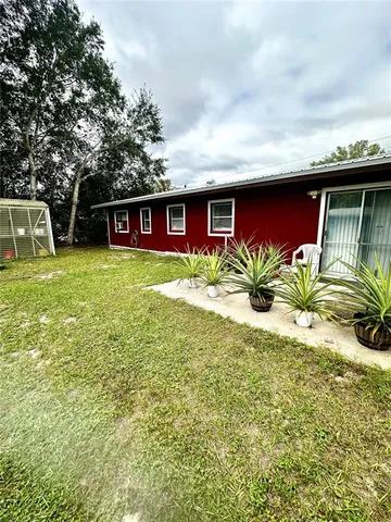 a house view with a garden space