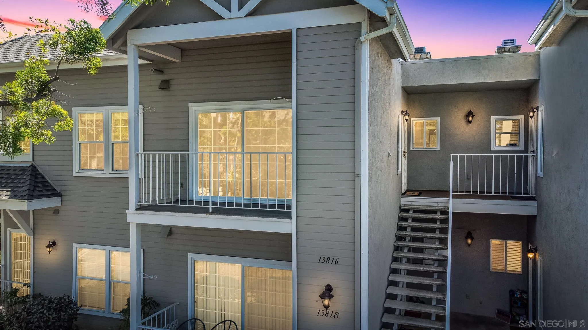 13816 Midland Road Poway, CA 92064 - Photo 1 of 37 a front view of a house with large windows