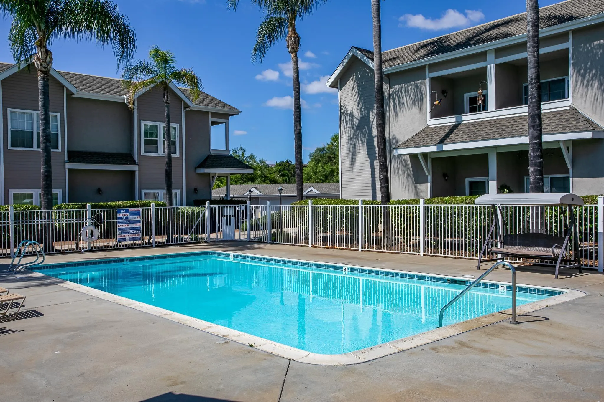 13816 Midland Road Poway, CA 92064 - Photo 33 of 37 a view of a house with a swimming pool