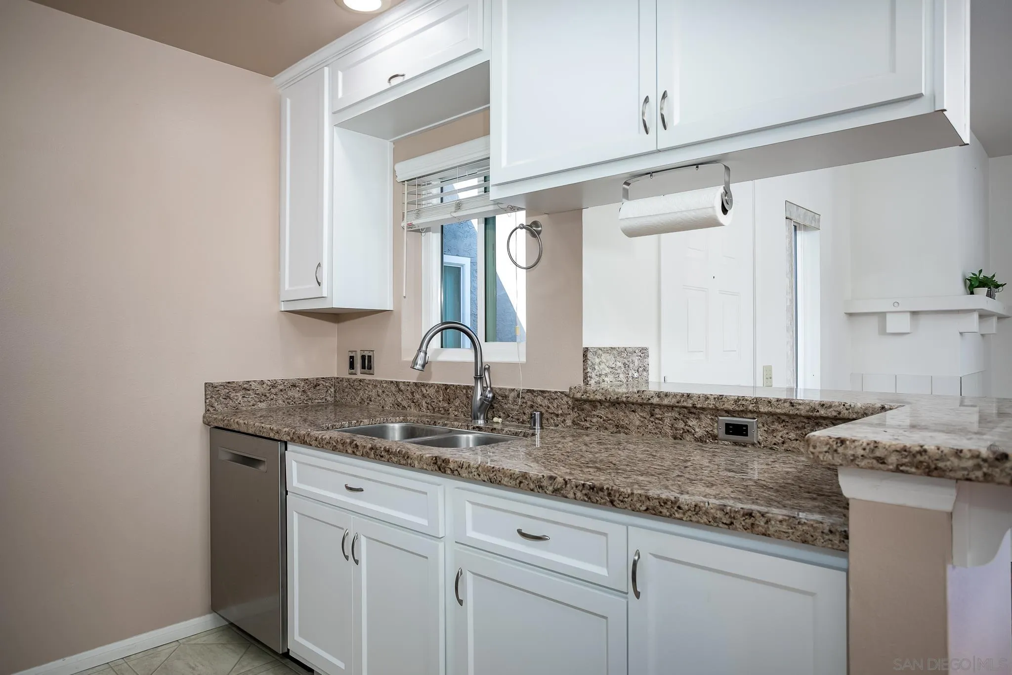 13816 Midland Road Poway, CA 92064 - Photo 7 of 37 a bathroom with a granite countertop sink and a mirror