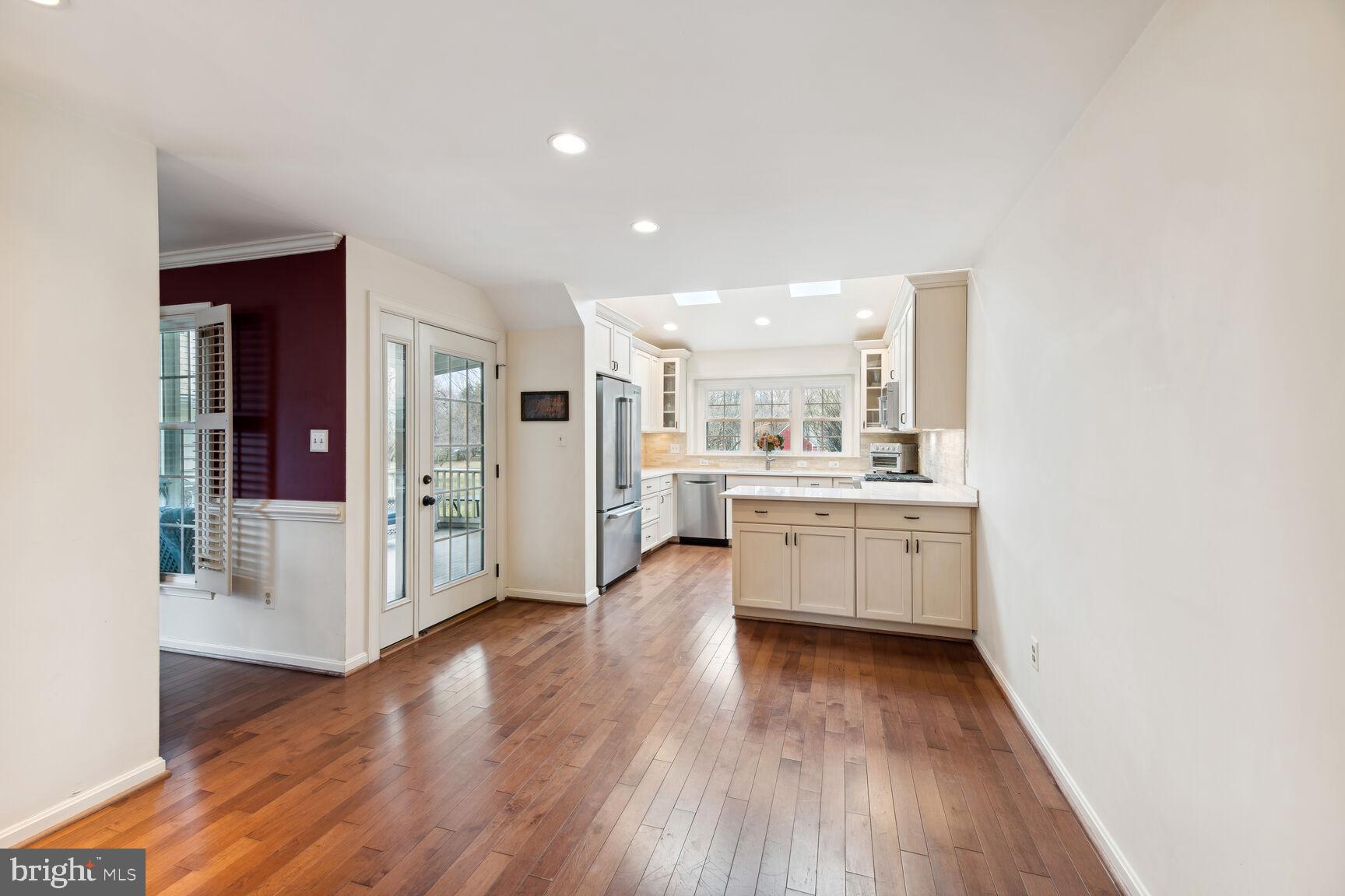 6603 Forsythia Street Springfield, VA 22150 - Photo 23 of 73 Casual Dining Flows Seamlessly to Kitchen!