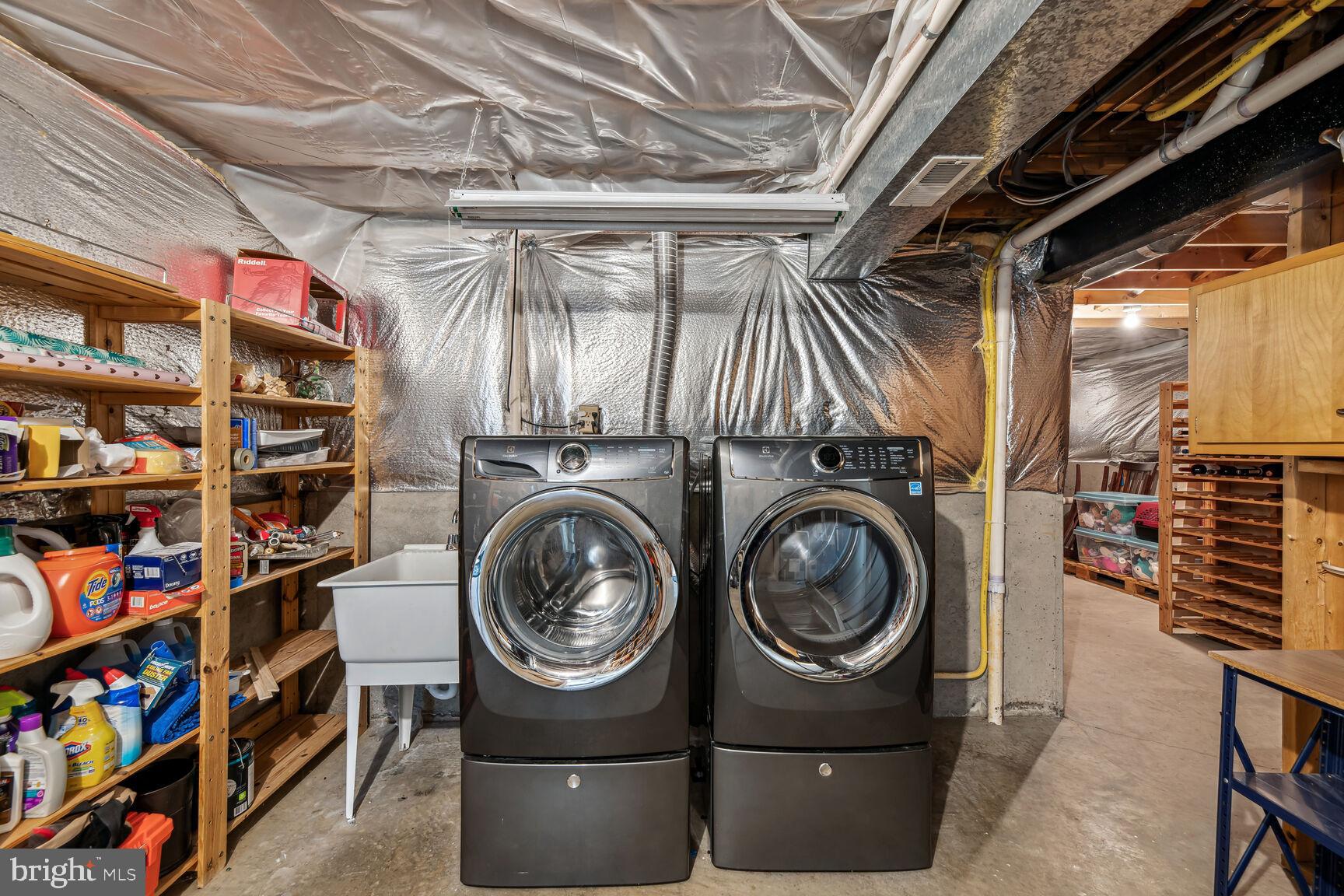 6603 Forsythia Street Springfield, VA 22150 - Photo 57 of 73 Dedicated, Spacious Laundry Area w/ Bonus Storage!