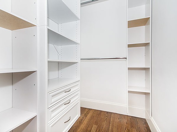 24-26 Beaconsfield Road, Unit 26 Brookline, MA 02445 - Photo 11 of 25 a view of walk in closet with wooden floor