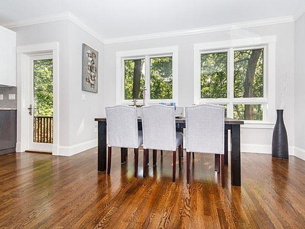 24-26 Beaconsfield Road, Unit 26 Brookline, MA 02445 - Photo 8 of 25 a view of a dining room with furniture and wooden floor