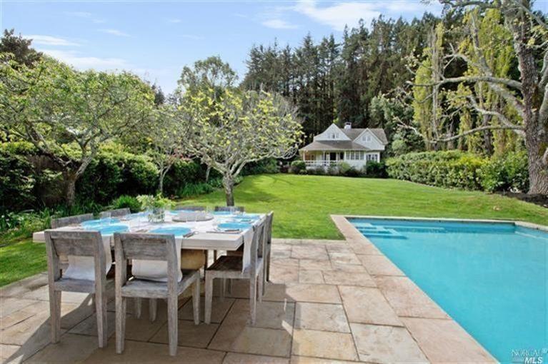 195 Lagunitas Road Ross, CA 94957 - Photo 1 of 1 a view of a chairs and table in the patio