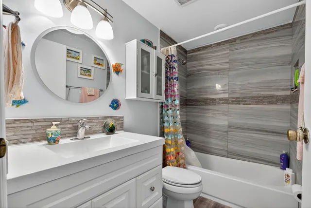 an aerial view of house with yard