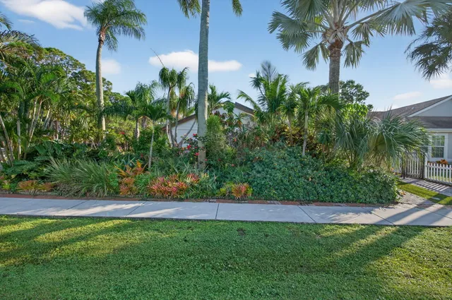 a view of a chairs and table on the wooden floor
