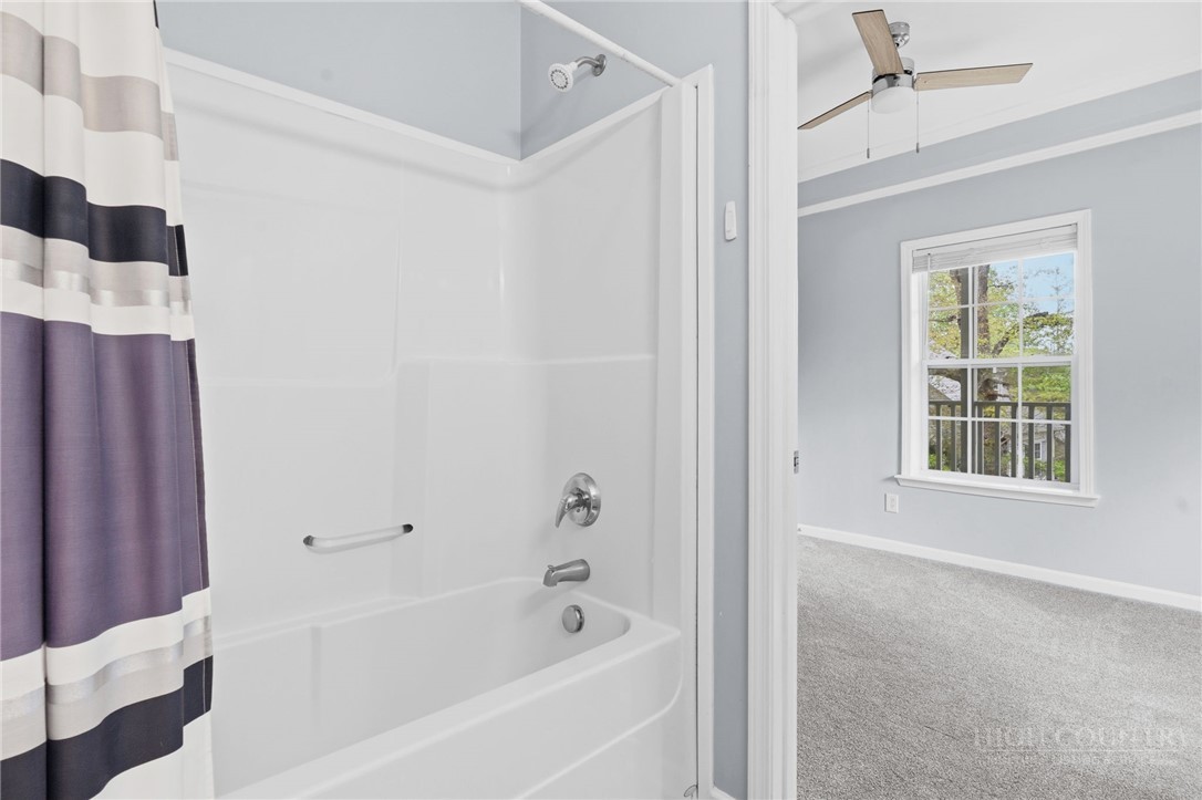 211 Cecil Miller Road, Unit 9 Boone, NC 28607 - Photo 20 of 32 a bathroom with a bathtub and a shower