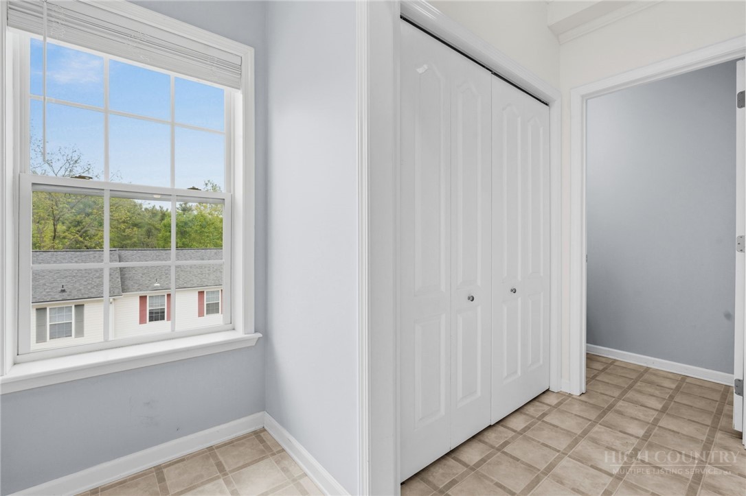 211 Cecil Miller Road, Unit 9 Boone, NC 28607 - Photo 21 of 32 a view of an empty room with window