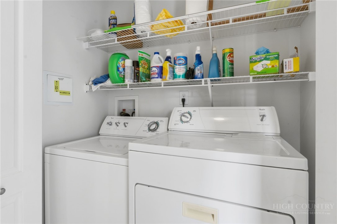 211 Cecil Miller Road, Unit 9 Boone, NC 28607 - Photo 23 of 32 a utility room with dryer and washer