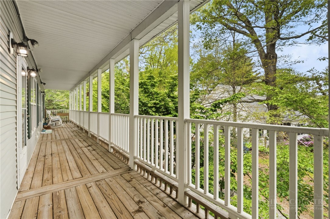 211 Cecil Miller Road, Unit 9 Boone, NC 28607 - Photo 25 of 32 a view of balcony with wooden floor