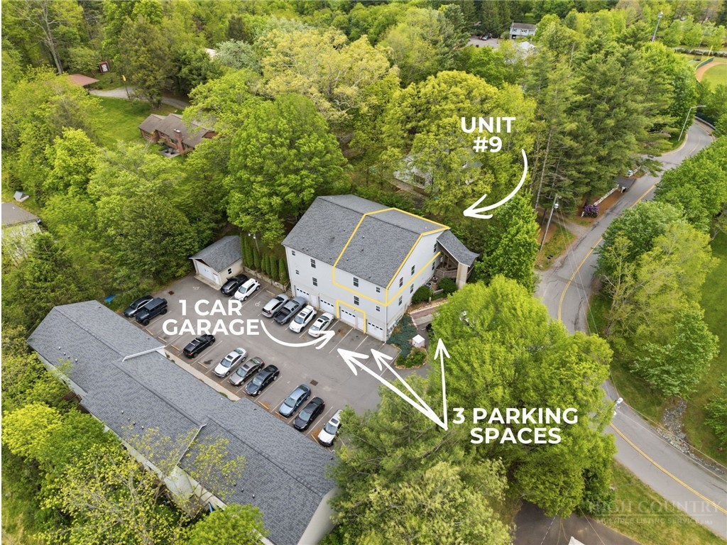 211 Cecil Miller Road, Unit 9 Boone, NC 28607 - Photo 27 of 32 an aerial view of a house with garden space and street view