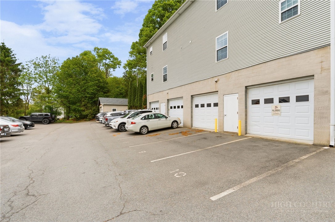 211 Cecil Miller Road, Unit 9 Boone, NC 28607 - Photo 29 of 32 a view of car parked in front of house