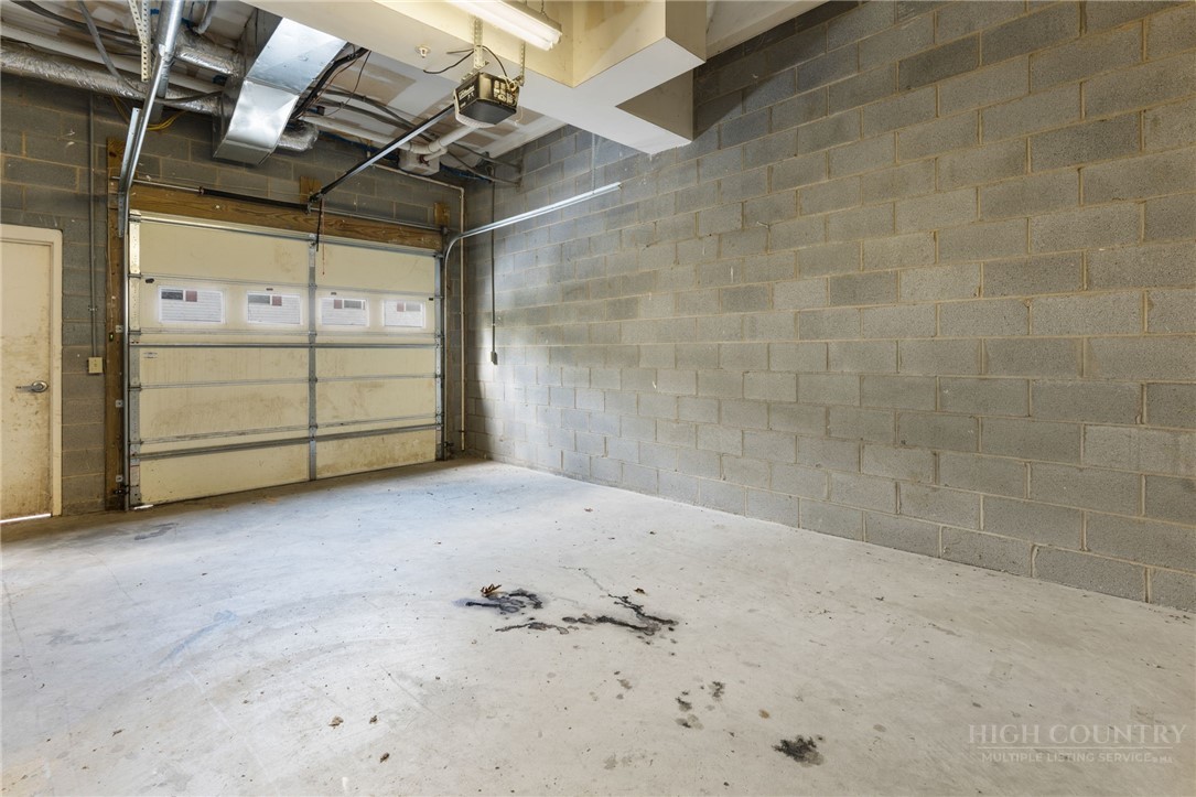 211 Cecil Miller Road, Unit 9 Boone, NC 28607 - Photo 30 of 32 a view of a garage room