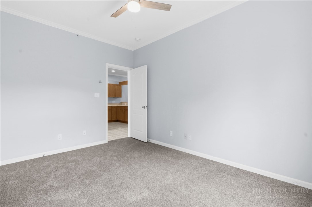 211 Cecil Miller Road, Unit 9 Boone, NC 28607 - Photo 10 of 32 an empty room with a natural light