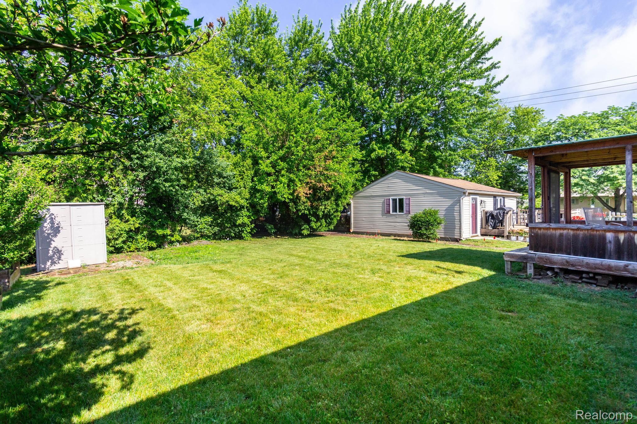 32016 Belcrest Road Rockwood, MI 48173 - Photo 35 of 40 Yard with Covered Deck