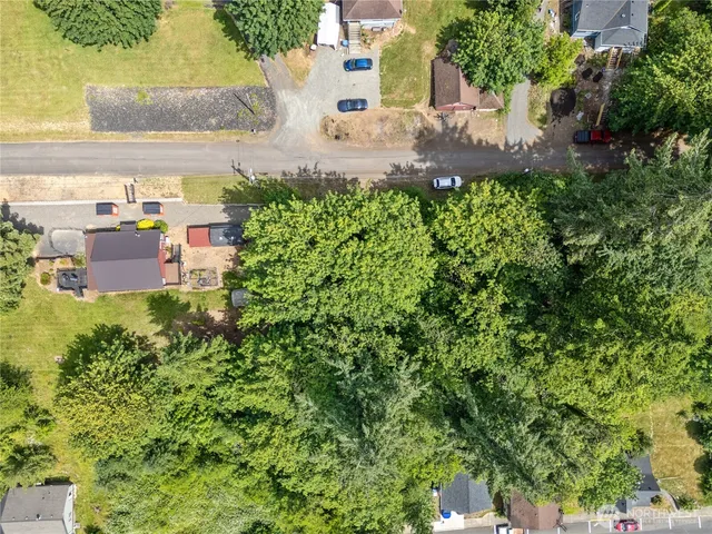 a view of a street with some trees