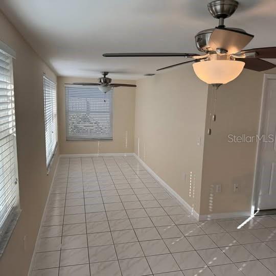 2154 Cedar Drive Dunedin, FL 34698 - Photo 8 of 19 a view of an empty room with a window