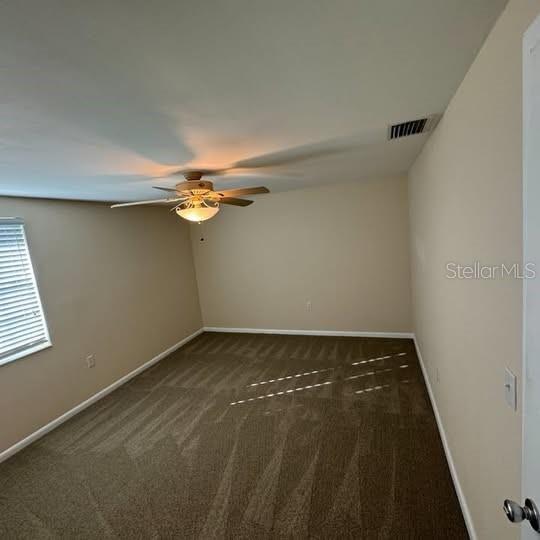 2154 Cedar Drive Dunedin, FL 34698 - Photo 10 of 19 en empty room with window