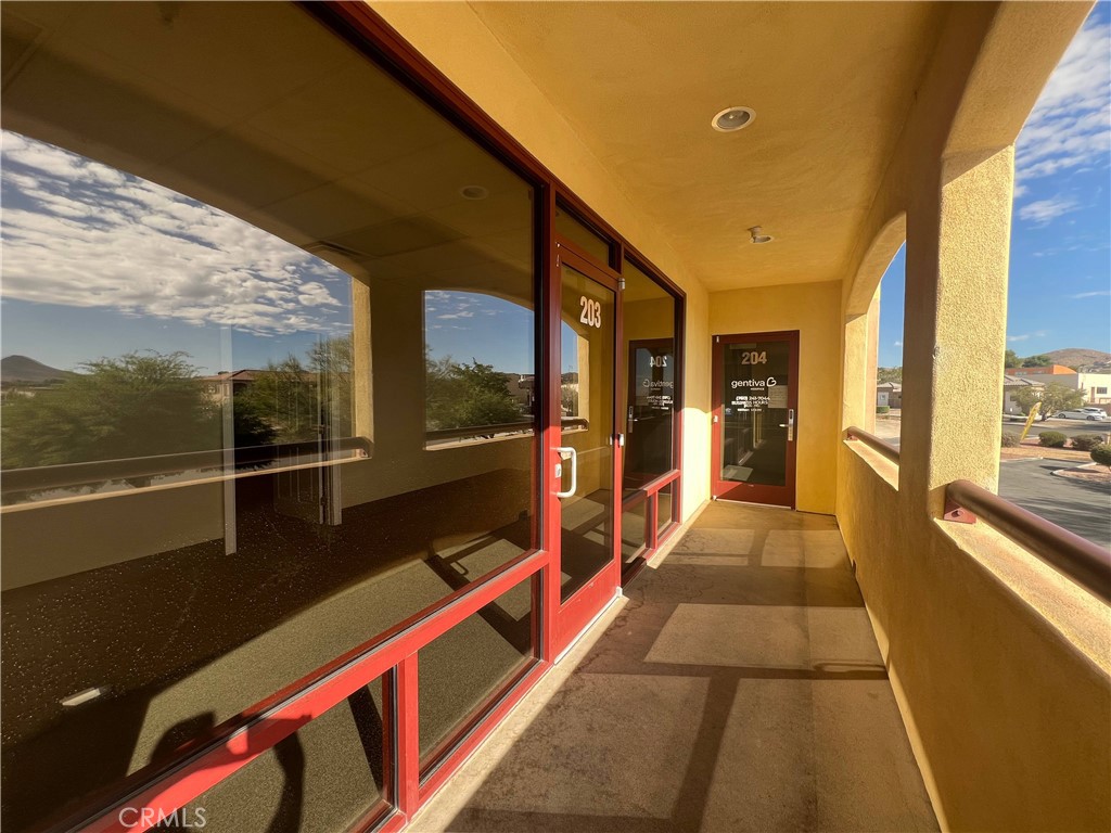 16070 Tuscola Road, Unit 203 Apple Valley, CA 92307 - Photo 13 of 14 a hallway with a large window