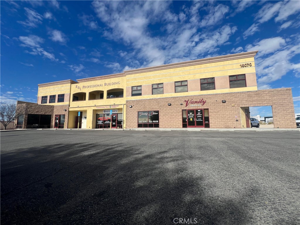 16070 Tuscola Road, Unit 203 Apple Valley, CA 92307 - Photo 14 of 14 a large building with front of it