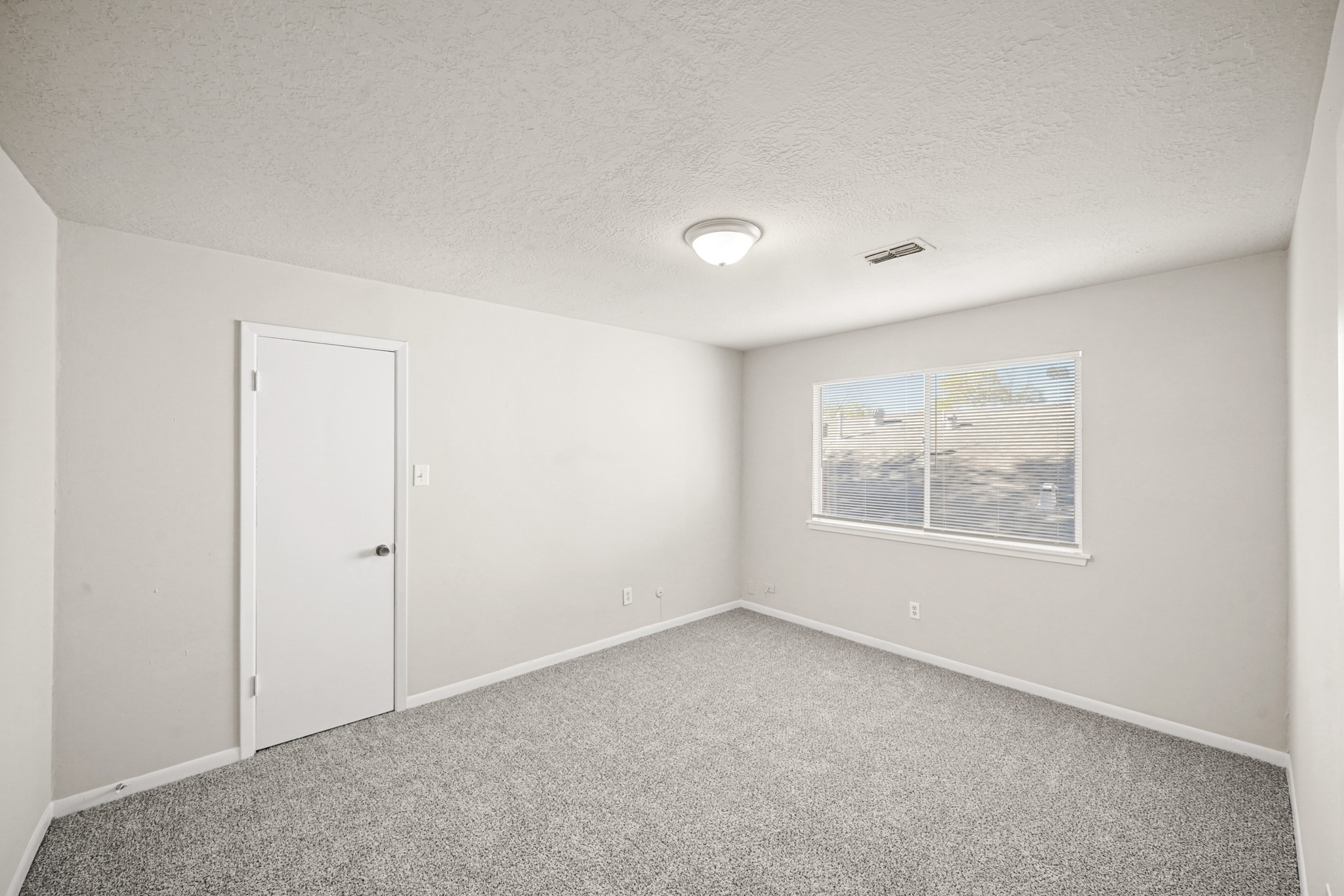 6514 Winkleman Road Houston, TX 77083 - Photo 10 of 15 an empty room with windows