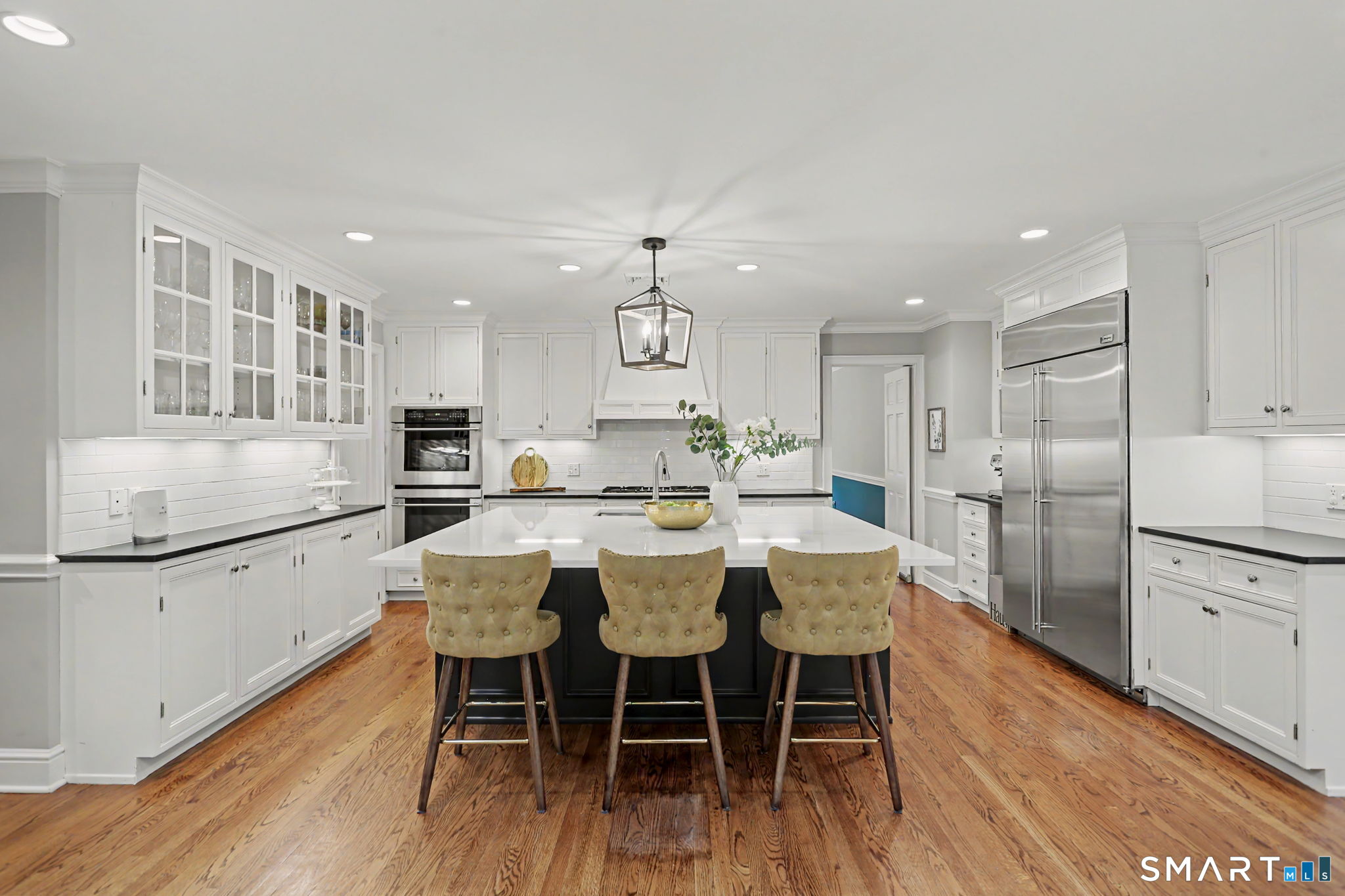 596 Silvermine Road New Canaan, CT 06840 - Photo 9 of 37 Chef's kitchen with large island and breakfast bar