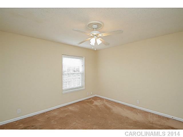 2632 Park Road, Unit H Charlotte, NC 28209 - Photo 15 of 23 a view of an empty room with a window
