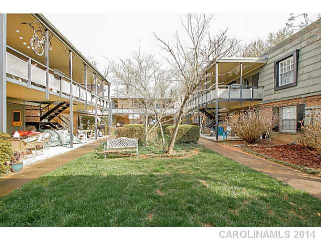 2632 Park Road, Unit H Charlotte, NC 28209 - Photo 19 of 23 a view of a house with a yard