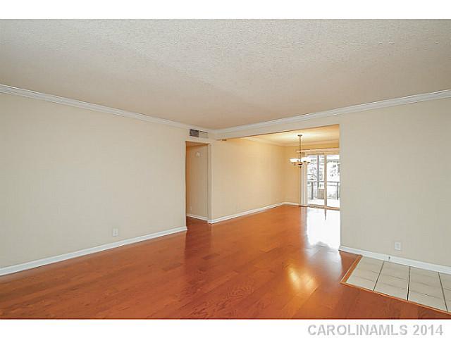 2632 Park Road, Unit H Charlotte, NC 28209 - Photo 6 of 23 a view of an empty room and window