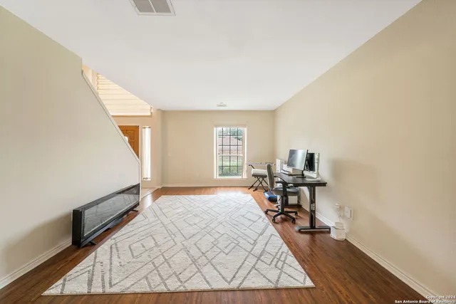 a bed room with a bed furniture and a window