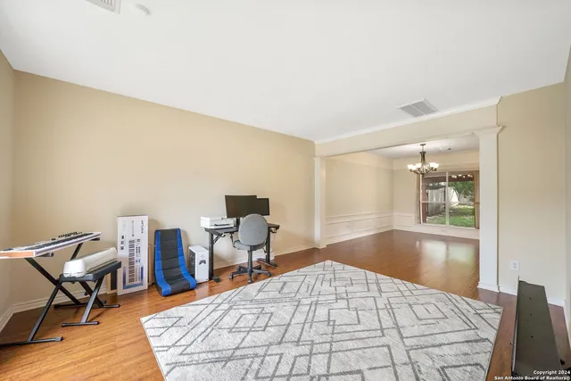 a bedroom with a bed and furniture