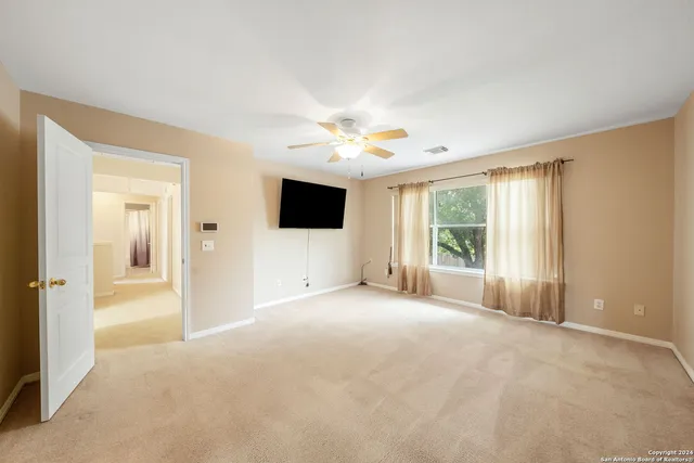 a view of a livingroom with a flat screen tv