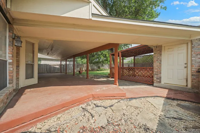 a view of a backyard of a house